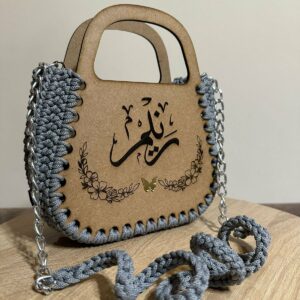 Sac à main crocheté de teinte sobre signé Sola. Tunisie