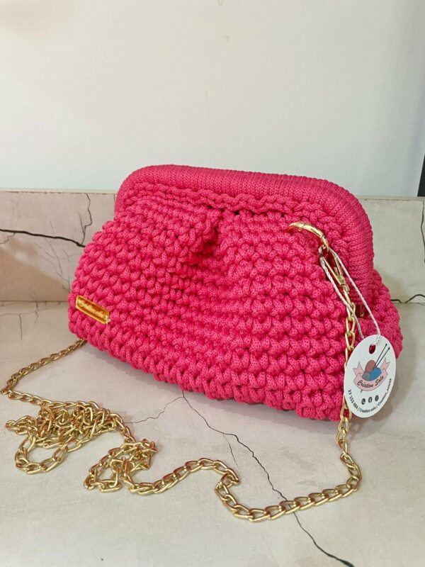 Clutch rose fait main en crochet, teinte unie, par Sola. Tunisie